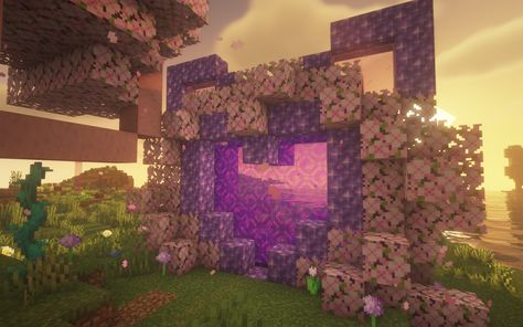 Pink Minecraft Builds Ideas, Sakura Build Minecraft, Cute Minecraft Portal Ideas, Heart Portal Minecraft, Nether Portal Design Cherry Blossom, Minecraft Cherry Blossom Color Palette, Heart Nether Portal Minecraft, Minecraft Sakura Builds, Minecraft Crater