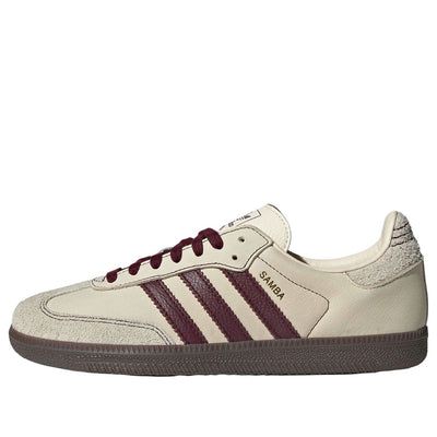 The adidas Samba OG 'Wonder White Maroon' is a classic silhouette with a premium nubuck upper, suede details, and contrast stitching. This iconic shoe has been a favorite since the 1950s, worn by everyone from athletes to musicians. Burgundy Samba Outfit, Burgundy Sambas Adidas, Maroon Sambas, Maroon Adidas Gazelle, Adidas Samba Maroon, Maroon Sneakers, Wales Bonner Samba Red, Maroon Adidas, Addias Shoes