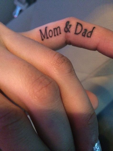 Tattoo for my mom and dad. On my first finger because they've always shown me the right direction. Unique Finger Tattoos, Finger Tattoos Fade, Side Finger Tattoos, Inner Finger Tattoo, Finger Tattoos Words, Flower Finger Tattoos, Finger Tattoos For Couples, Mom Dad Tattoo Designs, Butterfly Tattoo On Shoulder