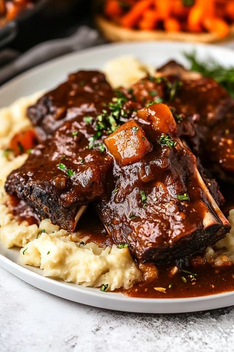 Tender, fall-off-the-bone short ribs simmered slowly for hours, infused with rich flavors of garlic, herbs, and a touch of red wine. Perfect for cozy dinners, this dish will make your home smell amazing as it cooks. Hungry? Click for the full recipe #SlowCookerRibs #ShortRibsRecipe #SlowCookerMeals #EasyDinnerIdeas #ComfortFood #BeefRecipes #FallRecipes #DinnerInspo #SlowCookerRecipes #CrockpotCooking #HeartyMeals #MealPrep #FamilyDinner #EasyCrockpotMeals Short Ribs Recipe Crockpot Bbq, Asian Short Ribs Recipe Crockpot, Crock Pot Boneless Short Ribs, Crockpot Meat Ideas, Crock Pot Short Ribs Recipe Crockpot, Italian Short Ribs Slow Cooker, Crockpot Short Ribs Slow Cooker Easy, Short Ribs In Slow Cooker, Slow Cooker Braised Short Ribs