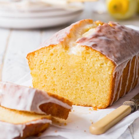 The Perfect Lemon Drizzle Cake (Gluten Free) - Intensely lemony, moist and with a delicate crumb, this lemon drizzle cake has it all. It’s the perfect everyday dessert that’s easy to prepare, and a joy to eat. Although, with how absolutely delicious it is, it would be welcome at any and all occasions. Lemon dessert. Easy dessert recipes. Gluten free desserts. Lemon cake recipe. Easy cake ideas. Gluten free cake. Pound cake. Lemon icing. Lemon frosting. #cake #recipes Gluten Free Lemon Drizzle Cake, The Loopy Whisk, Lemon Glaze Cake, Loopy Whisk, Glutenfri Baking, Gluten Free Cake Recipe, Gluten Free Chocolate Cake, Lemon Frosting, Lemon Drizzle Cake