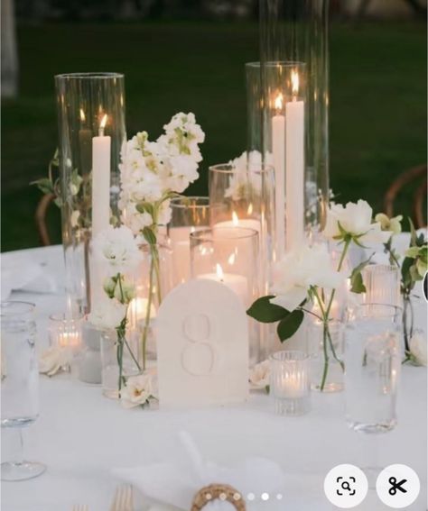 Wedding Table Centerpieces Elegant, Flameless Candles Wedding, White Wedding Flowers Centerpieces, Bud Vases Wedding, Round Wedding Tables, Candle Table Centerpieces, Wedding Table Designs, Candle Wedding Centerpieces, Wedding 2025