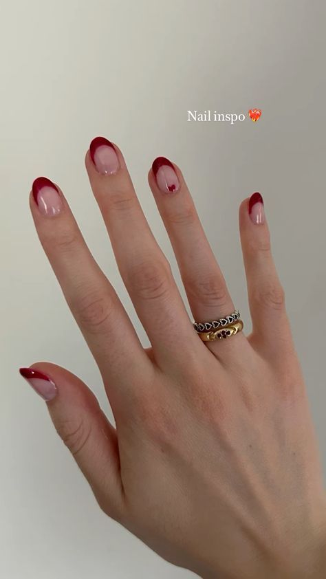 Red Tip With Heart Nails, Subtle Vday Nails, Short Valentines Nails Almond, Valentines Nails Minimal, Gel Nail Designs Valentines Day Simple, Red French Tip With Heart On Ring Finger, Tiny Red Heart Nails, Red With Pink Nails, Red Tie Nails