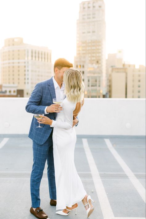 couple engagement shoot champagne golden hour sunset White Blazer Engagement Photos, Fancy Engagement Photos Outfits, Engagement Photos White Backdrop, Mens Engagement Shoot Outfit, Engagement Photos Outfits Elegant, Engagement Photos Fancy Outfits, Modern Classic Engagement Photos, Elegant Engagement Photos Outfits, Engagement Photo Men Outfit