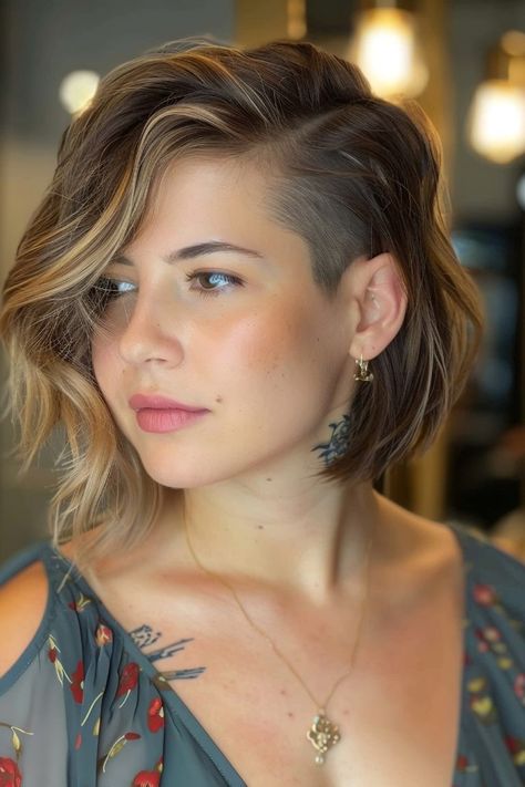 Effortlessly cool shaggy chic haircut with a subtle undercut for 2024 Edgy Bob With Undercut, Shaved Undercut Hairstyles, Long Bob With Undercut For Women, Shaved Hair On One Side Short, Womens Undercut Bob, Edgy Chic Hairstyles, Short Side Haircut Women, Shaggy Hair With Undercut, Short Hair Undercut Updo