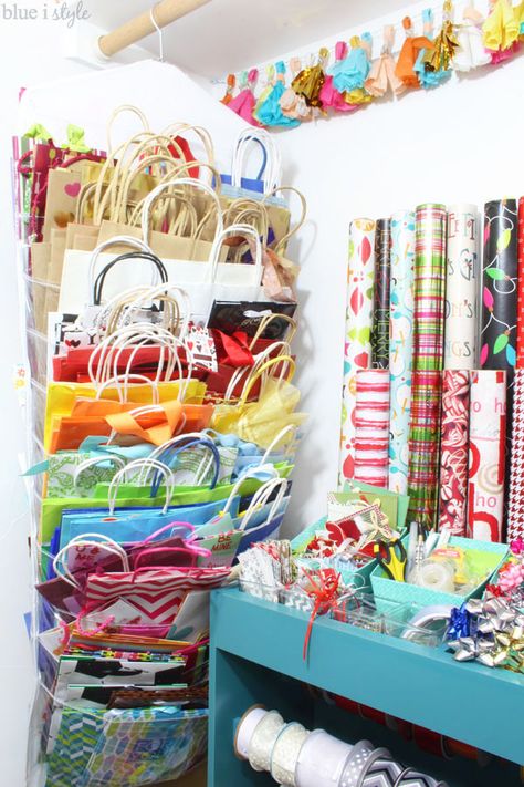 Take advantage of that under-utilized space in your guest room closet to organize all of your gift wrap supplies - from wrapping paper and gift bags, to ribbon and gift tags, and even greeting cards and stationery...tips to organize it all! Wrapping Supplies Storage, Gift Wrap And Bag Storage, Organizing Gift Bags And Tissue Paper, Gift Bags Organizer Storage Ideas, Gift Bag Organizer Storage Ideas, Organization Ideas For Gift Bags, Gift Wrap Storage Closet, Gift Tag Storage, How To Organize Gift Bags And Tissue Paper