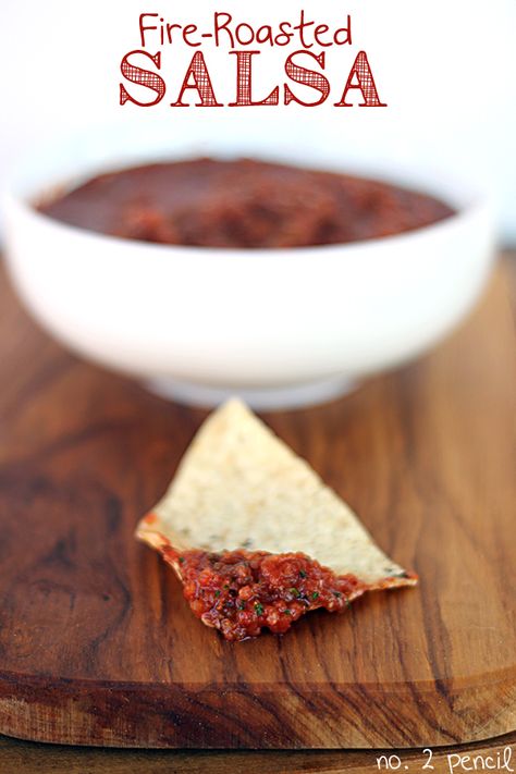 Fire-Roasted Salsa Recipe 2 14.5 oz cans of diced, fire-roasted tomatoes, drained 1 chipotle pepper from a can of chipotle peppers in adobo sauce 1 tablespoon of chipotle in adobo sauce, from the same can as the pepper ½ of a yellow onion 2 garlic cloves Juice from one lime ¼ cup of loosely packed fresh cilantro leaves 1 teaspoon of sugar 1 teaspoon of cumin 1 teaspoon of kosher salt Smokey Chipotle Salsa, Roasted Salsa Recipe, Fire Roasted Salsa, Chipotle Salsa, Chipotle In Adobo Sauce, Roasted Salsa, Tortilla Chip Recipe, Chipotle Peppers, No 2 Pencil