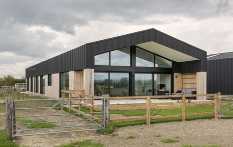 An award-winning Class Q permitted development project consisting of the conversion of two tired steel and concrete framed barns near Long Crendon in Buckinghamshire into modern, energy-efficient family homes. Modern Steel Building, Factory Home Conversion, Converted Warehouse Home Exterior, Industrial Building Conversion, Converted Factory Home, Modern Barn Conversion Interiors, Modern Barn Conversion, Warehouse Conversion Home, Converted Barn Homes