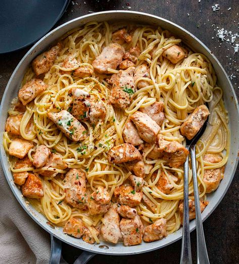 Creamy Chicken Pasta is a delectable and satisfying dish that combines tender linguine noodles with seasoned cubes of chicken in a rich and flavorful garlic cream sauce. Fresh parsley adds color, and if you like some heat, you can sprinkle optional red pepper flakes on top. Overall, it's a dish that's comforting, satisfying, and packed with deliciousness! And, it's super easy to throw together! Linguine Recipes Chicken, Brussel Sprout Pasta, Chicken Linguine, Italian Pasta Sauce, Garlic Cream Sauce, Creamy Chicken Pasta, Garlic Cheese Bread, Garlic Cheese, Penne Pasta