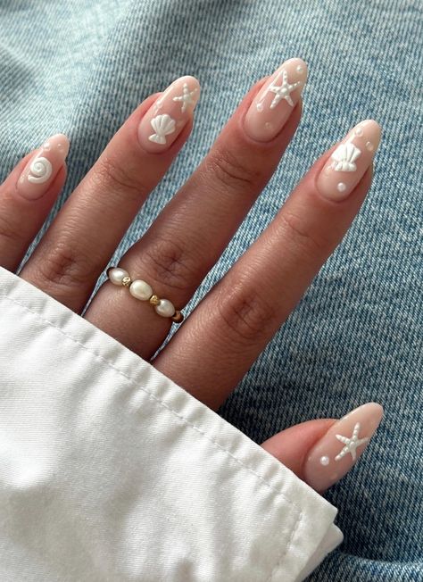 Your daily dose of the most viral beach nails from the biggest nail gurus! Find #summer 2024 nail inspo for the cutest summer nails, featuring ocean nails, vacation nails, beach nails, and tropical nails! #nails inspo #summernails Summer Nails 2024 Starfish, Nails Starfish Design, West Coast Nails, Beach Nails Starfish, White Starfish Nails, East Coast Nails, Starfish Nails Design, White Detail Nails, Star Fish Nail Art