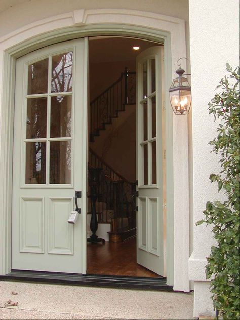 French Colonial Entry...  Love the double door entry. Double Arched Front Door, French Country Double Front Door, Colonial Double Door, Double Door Arched Entryway, Arched Double Front Entry Doors, Double Front Door With Arched Transom, Antique Double Front Door, Colonial Doors, Open Entryway