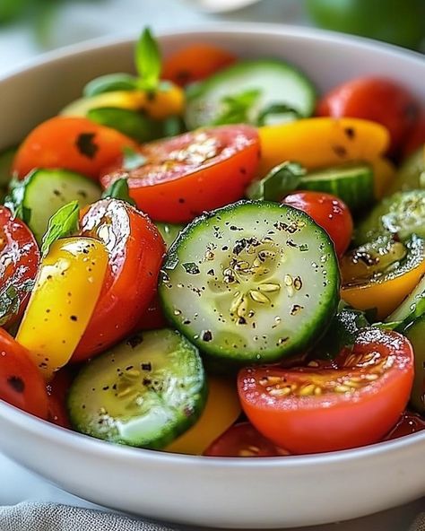 WOULD YOU DIVE INTO THIS REFRESHING 🥒 Cucumber Tomato Salad with Feta 🍅? Fresh flavors that bring the family together! A healthy, vibrant salad perfect for any meal! 🍽️ Ingredients 🍽️ - 2 Cucumbers, sliced - 1/4 cup Olive Oil - 1 large Red Onion, sliced - 1/2 teaspoon Chili Flakes - 1/2 teaspoon ground Black Pepper - 4 cups Cherry or Grape Tomatoes, halved - 3/4 teaspoon Salt - 1 Tablespoon Sugar - 1/4 cup Parsley, chopped and loosely packed - 2 Tablespoons Red Wine Vinegar - 1/2 cup Basil,... Tomato Salad With Feta, Vibrant Salad, Tomato Cucumber Salad, Pizza Roll, Salad With Feta, Cucumber Tomato Salad, Salad Sauce, Garden Salad, Brussels Sprouts Recipe