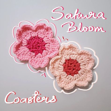 Sakura Bloom Crochet Coasters🌸 Sip in style with these pretty cherry blossom inspired coasters🍵💕 Perfect for springtime!✨🍃 for more details, dm or check the link in my bio💗 . . . . . #SakuraBloom #CherryBlossomCoaster #CrochetCoasters #HandmadeCoasters #SpringDecor #SakuraDecor #CrochetDecor #HomeDecorIdeas #BloomingDecor #CherryBlossomLove #CrochetArt #HandmadeWithLove #CraftyCreations #InstaCrochet #SmallBusinessOwner #SupportSmallBusiness #fyp #explore Sakura Coaster Crochet, Sakura Coaster, Sakura Crochet, Coasters Aesthetic, Knitting 101, Sakura Bloom, Crochet Inspo, Handmade Coasters, Cherry Blossom Flowers