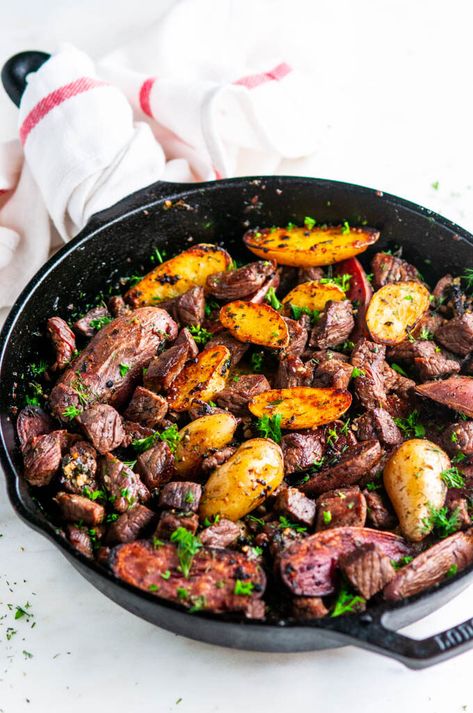 Skillet Garlic Butter Steak and Potatoes - Aberdeen's Kitchen Butter Herb Sauce, Juicy Steak Bites, Parmesan Crusted Steak, Garlic Butter Steak And Potatoes, Butter Steak And Potatoes, Crusted Steak, Butter Herb, Steak And Potatoes, Steak Potatoes