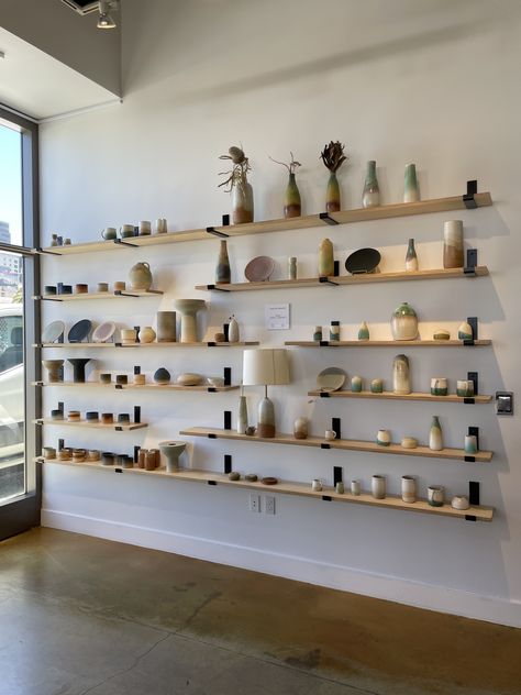 Ceramic Window Display, Pottery Shelf Display, Ceramic Collection Display, Retail Wall Shelving, Ceramic Store Interior Design, Ceramic Display Shelves, Pottery Shop Display, Pottery Gallery Display, Ceramic Shop Display