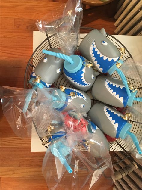 Party favors! Shark sippy cups (thank you party city) with a baggie of Swedish Fish & giant gummy sharks Shark Wedding, Shark Food, Jaws Party, Gummy Sharks, First Birthday Theme Ideas, Underwater Birthday, Surf Boy, Shark Themed Birthday, Birthday Under The Sea