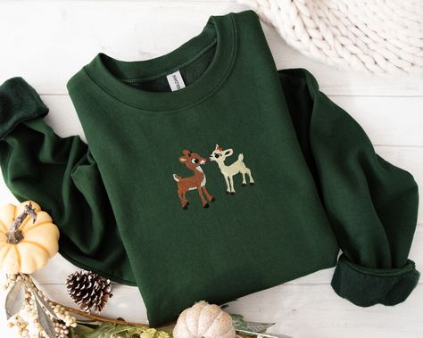 Rudolph & Clarice ❤️ Vintage Christmas sweater with embroidered design - available now! #rudolphtherednosedreindeer #embroidery #christmassweater #christmasoutfit Rudolph And Clarice, Embroidered Christmas Sweater, Vintage Christmas Sweaters, Rudolph Christmas, Winter Apparel, Embroidered Christmas, Cute Shirt Designs, Trendy Winter, Embroidery Sweatshirt