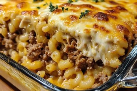 Introduction: Elevate your comfort food game with this Meatloaf Mac Casserole��—a delicious fusion of classic meatloaf and creamy macaroni and cheese. This hearty casserole combines seasoned ground beef with a ... Learn More Mac Cheese Meatloaf, Mac And Cheese Meatloaf Casserole Easy, Meatloaf And Mac And Cheese Casserole, Meatloaf Casserole With Mashed Potatoes, Meatloaf Mac And Cheese Casserole, Mac And Cheese Meatloaf Casserole Recipe, Mac N Cheese Meatloaf Casserole, Mac And Cheese Meatloaf Casserole, Cheesey Meatloaf