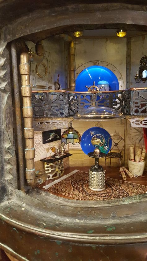 Jules Verne inspired steampunk diorama Steampunk Diorama, Scifi Decor, Oval Tile, Steampunk Interior, Nautical Aesthetic, Bookshelf Art, Steampunk House, Leagues Under The Sea, Jules Verne