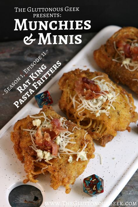 Cheesy Rat King Pasta Fritters inspired by Dungeons & Dragons. Recipe by The Gluttonous Geek. Dungeons And Dragons Recipes, Skyrim Cookbook, Dnd Recipes, Dnd Snacks, Hobbit Recipes, Fantasy Feast, Fantasy Recipes, Dnd Night, Blueberry Waffles Recipe