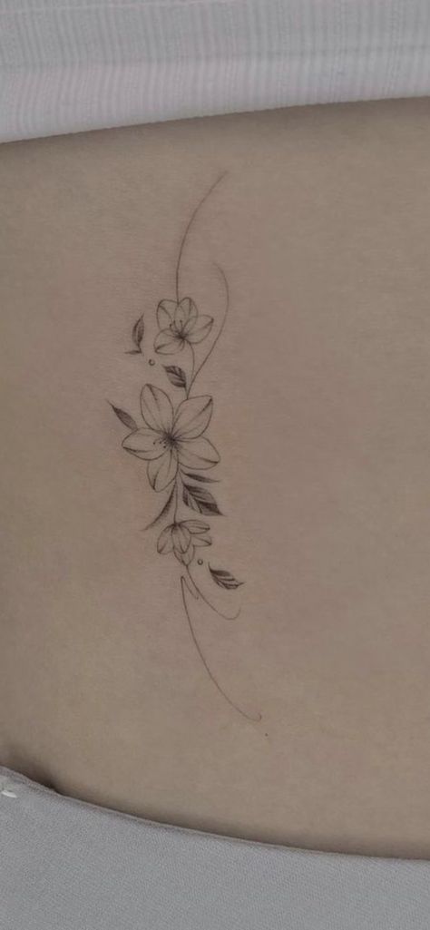 Small Vine Of Flowers Tattoo, Plumeria Tattoo Wrist, Lotus Flower And Vines Tattoo, Jasmine Flower Back Tattoo, Plumeria Back Tattoo, Clavicle Tattoos For Women Flowers, Small Vine Tattoo Simple, Plumeria Shoulder Tattoo, Plumeria Vine Tattoo