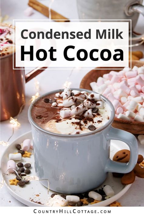 Condensed milk hot chocolate is the sweetest and creamiest way to warm up this winter! Made with 5 ingredients, the recipe is a twist on traditional hot cocoa, perfect to cozy up during the holidays and colder months. Thanks to condensed milk and cocoa powder, this drink has a rich chocolate flavor and thick, dreamy texture. Top your hot cocoa with marshmallows, chocolate chips, cinnamon, hot fudge sauce, cookies, peppermint, peanut butter, Biscoff and white chocolate. | CountryHillCottage.com Hot Cocoa With Almond Milk, Condensed Milk Hot Chocolate, Condensed Milk And Cocoa Powder, Chewy Caramels Recipe, Chocolate With Cocoa Powder, Mint Hot Chocolate Recipe, Gourmet Drinks, Hot Chocolate With Cocoa Powder, Cookies Peppermint