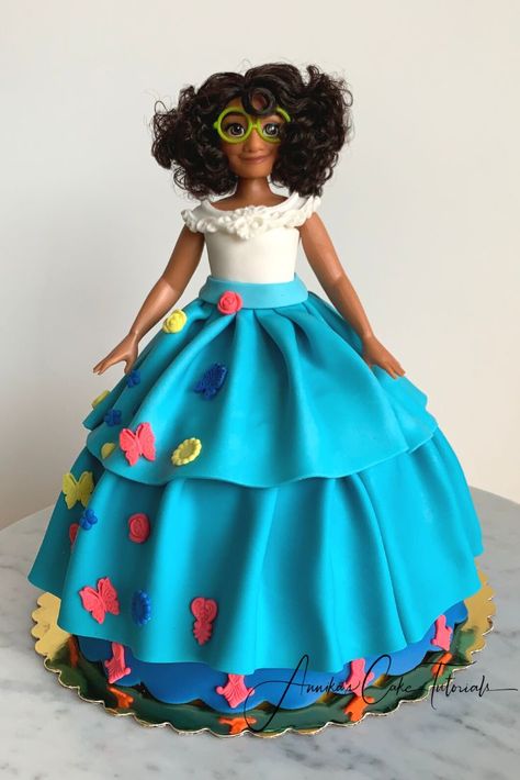 Mirabel Doll Cake, Maribel Birthday Party, Encanto Doll Cake, Maribel Encanto Cake, Mirabel Encanto Cake, Disney Doll Cake, Encanto Cakes, Flowers Recipes, Encanto Cake