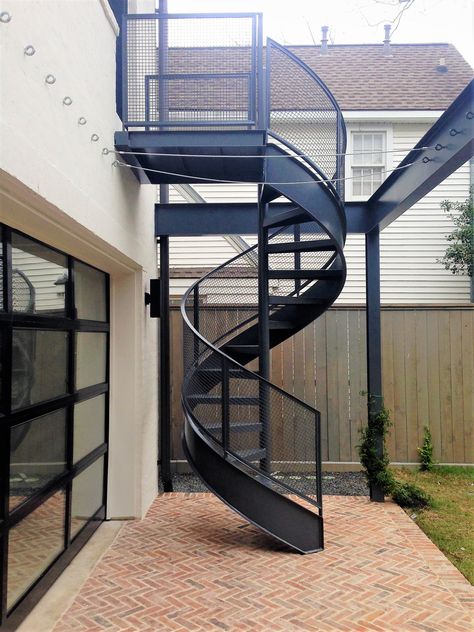 This is an all steel, code compliant spiral stair. Has a flat bar handrail with flat bar post, with a stringer and a mesh rail system. Get your free quote today! www.stairwaysinc.com Steel Spiral Staircase Outdoor, Outdoor Stair Design, Diy Spiral Staircase, Outside Stairs Design, Mesh Railing, Metal Spiral Staircase, Spiral Staircase Outdoor, Spiral Staircase Kits, Staircase Manufacturers