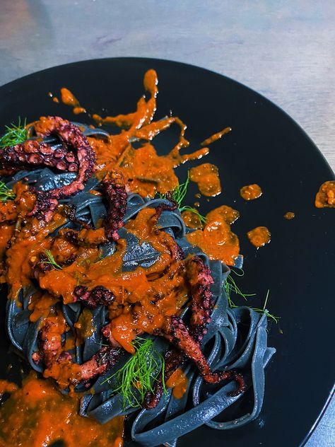 Grilled octopus served with squid ink pasta & a spicy rustic tomato sauce. Ink Pasta, Squid Ink Pasta, Grilled Octopus, Halloween Party Dinner, Halloween Dinner, Halloween Food, Tomato Sauce, Octopus, Ariel