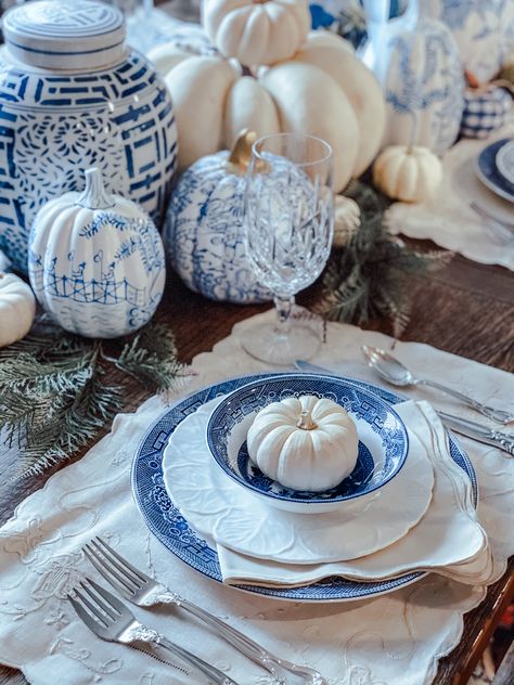 Read my blog post for tips on how to easily style your Thanksgiving table without breaking the bank! Table Setting Blue & White chinoiserie pumpkins preppy traditional home decor tablescape pagoda blue gingham turkey plates china silver crystal fancy white pumpkins blue pumpkins scalloped napkins scalloped placemats blog place setting blue willow china spode antique grandmillennial granny chic White And Blue Thanksgiving Table, Blue And White China Table Setting, Grandmillenial Table Setting, Chinoiserie Thanksgiving Table, Blue Willow Table Setting, Blue And White Thanksgiving Tablescape, Blue Willow Tablescapes, Grandmillennial Wedding, Blue Home Aesthetic