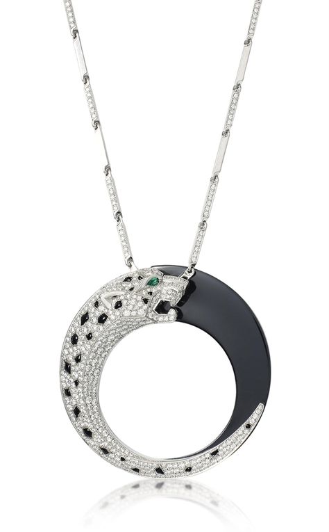 A BLACK CERAMIC, ONYX AND DIAMOND 'PANTHERE ECLIPSE' NECKLACE, BY CARTIER The rectangular baton link necklace partially diamond-set to the front, suspending a reversible circular pendant, designed as a tapering pavé-set brilliant-cut diamond panther's head with onyx spot and emerald eye detail, the reverse similarly modelled in polished black ceramic, pendant 5.5cm, chain 80.0cm, with French assay marks for gold Heart Shaped Diamond Necklace, Panther Jewelry, Beautiful Diamond Necklace, Black Onyx Jewelry, Cartier Panthere, Wedding Earrings Drop, Onyx Jewelry, Cat Jewelry, Classy Jewelry