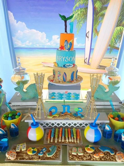 Beach / Surf Birthday Party Ideas | Photo 7 of 11 | Catch My Party Surf Up Birthday Party, Summer Birthday Party Ideas For Boys 1st, Beach 1st Birthday Party Boy, Surfer Party Ideas, Boys Luau Birthday Party, 1st Birthday Boy Pool Party Ideas, Surf Birthday Party Boy, Surf Party Ideas, Surfs Up Birthday Party