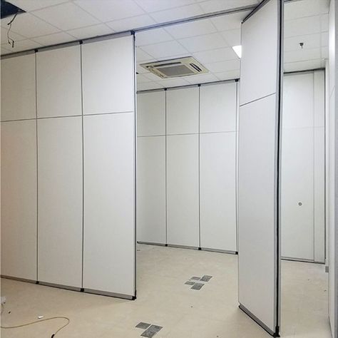 The folding soundproof wall is a series of ceiling mounted moveable partition but also sound insulation. #soundproofpartition #roompartition #partitionwall #partitiondoor #door #wall #panel #divider #division #officepartition #foldingwall #aluminumalloy #officedesign #officefitout #interiordesigners #contracting #consulting #building #architecture #furniture #moderndesign Wall Panel Divider, Moveable Partition Wall, Office Partition Design, Moveable Partition, Soundproof Wall, Movable Partition, Folding Partition, Wardrobe Wall, Panel Divider