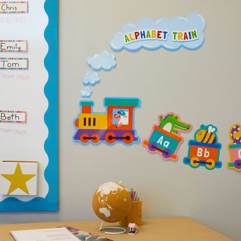 This 31 piece set of alphabet train classroom bulletin board borders are perfect to help little ones learn their ABCs. Each train cart features an upper case and lower case letter with a picture of a cute animal or item to help students remember and learn the alphabet! Use the borders for bulletin boards to elevate a regular whiteboard, chalkboard, corkboard, or window and create a fun environment for your students to learn. The fun, eye-catching train design will ensure your students don’t miss School Board Decoration Alphabet, Preschool Classroom Alphabet Display, Alphabets Decoration Classroom, Alphabet Wall Decor Classroom, Abc Decorations Classroom Decor, Abc Classroom Decor Letters, Train Classroom Decorations, Border Design For School Board, Alphabet Bulletin Board Ideas