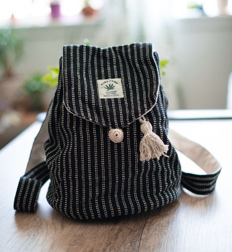 🌿🎒 Introducing our eco-friendly and stylish 100% hemp bucket backpack! Handwoven with love and care, this backpack is the perfect companion for your sustainable lifestyle. Made from natural and durable hemp fibers, it offers both functionality and a touch of bohemian charm. 🌱✨ 👜🌿 With its spacious interior and adjustable straps, this backpack is designed to carry your essentials comfortably. Whether you're heading to the farmer's market, going on a hike, or simply running errands, this backpack is versatile enough to meet your needs. 🏞️🛒 🌍 Our hemp bucket backpack is not only fashionable but also environmentally conscious. Hemp is a renewable resource that requires minimal water and pesticides to grow, making it a sustainable choice. By choosing this backpack, you're making a posit Nepal Village, Hemp Backpack, Village Women, Bucket Backpack, Hemp Bag, Women Crafts, Cute Backpacks, Environmentally Conscious, Sustainable Lifestyle