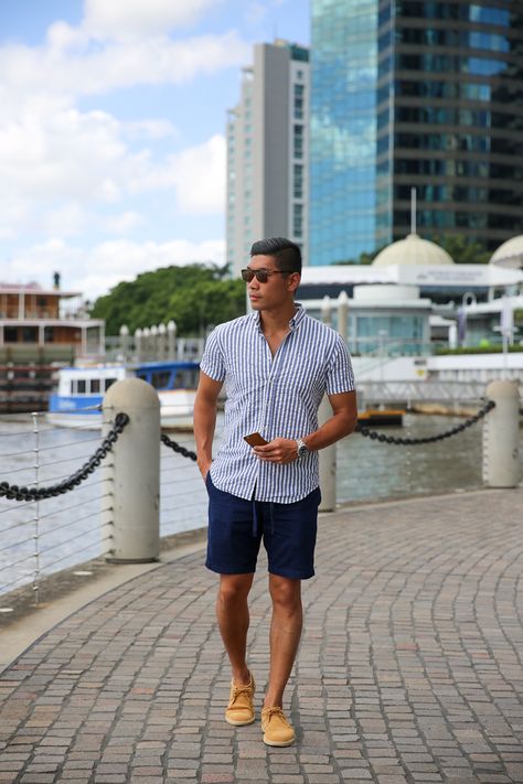 Striped short sleeve shirt + navy shorts + tan shoes Navy Blue Shorts Outfit Men, Navy Shorts Outfit Men, Blue Short Sleeve Shirt Men Outfit, Mens Shorts And Loafers Outfit, Striped Shorts Outfit Men, Summer Blue Relaxed Fit Polo Shirt, Navy Casual Short Sleeve Polo Shirt, Shirt Combination Men, Navy Shorts Outfit