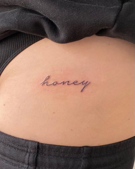 Womens Scripted tattoo “honey” Golden Cursive Tattoo, Honey In Cursive Tattoo, Loose Cursive Tattoo, Fine Line Written Tattoo, Honey Hip Tattoo, Honey Script Tattoo, Honey Word Tattoo, Honey Tattoo Words Fonts, Honey Tattoo Words