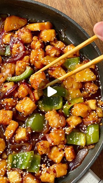 BOSH! by Henry & Ian on Instagram: "SWEET AND SOUR CRISPY TOFU 💥  Friday night Chinese takeaway anyone? If you have a sweet and sour fix but are trying to dial down on the meat, then this super easy Sweet and Sour Crispy Tofu needs to be on your dinner menu tonight 🙌  Ready in under 30 minutes, everyones favourite takeout classic has been remade with super smooth tofu that’s got all the meaty eaters looking twice.  Check out the full recipe below.  INGREDIENTS 1 x 280g block of firm tofu 6cm piece fresh ginger 1 red onion 1 garlic clove 1 green pepper 200ml pineapple juice 60ml rice vinegar 60ml tomato ketchup 70g light brown sugar 1 tsp garlic powder 1 tsp onion powder, optional 4 tbsp cornflour 2 tbsp vegetable oil 2 tbsp sesame oil 1⁄2 tsp chilli flakes 1⁄2 tsp salt 100g tinned pineap Chinese Takeaway, Pineapple Chunks, Firm Tofu, Vegetarian Entrees, Crispy Tofu, Garlic Clove, Green Pepper, Tomato Ketchup, Chilli Flakes