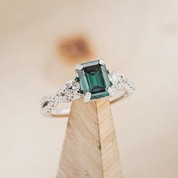 Green Moissanite Engagement Ring, Green Moissanite, Engagement Rings Twisted, Staghead Designs, Emerald Cut Moissanite, White Gold Engagement Ring, Twisted Band, Popular Designs, Ring With Diamond