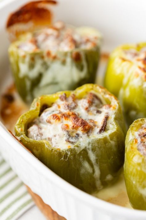 a casserole dish with philly cheese steak stuffed peppers Philly Cheese Steak Stuffed Peppers, Italian Stuffed Peppers, Cheesesteak Stuffed Peppers, Quinoa Stuffed Peppers, Poultry Dishes, Bell Pepper Recipes, Messy Kitchen, Green Peppers, Philly Cheese Steak