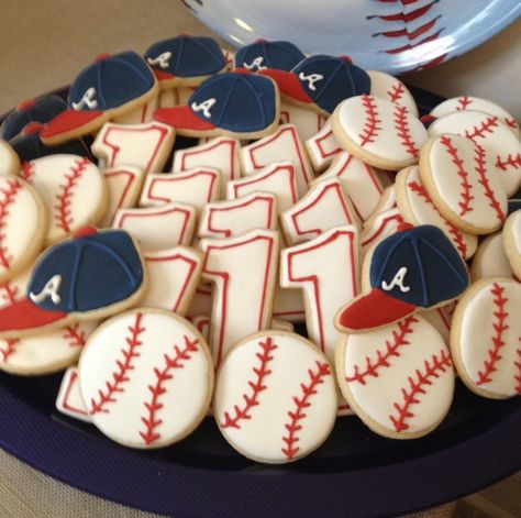 Baseball party ideas. Braves Themed Party, Braves Baseball Birthday Party, Baseball Hat Cookies, Atlanta Braves Birthday Party, Phillies Party, Atlanta Braves Birthday, Baseball Birthday Party Ideas, Baseball Theme Birthday Party, Baseball Cookies