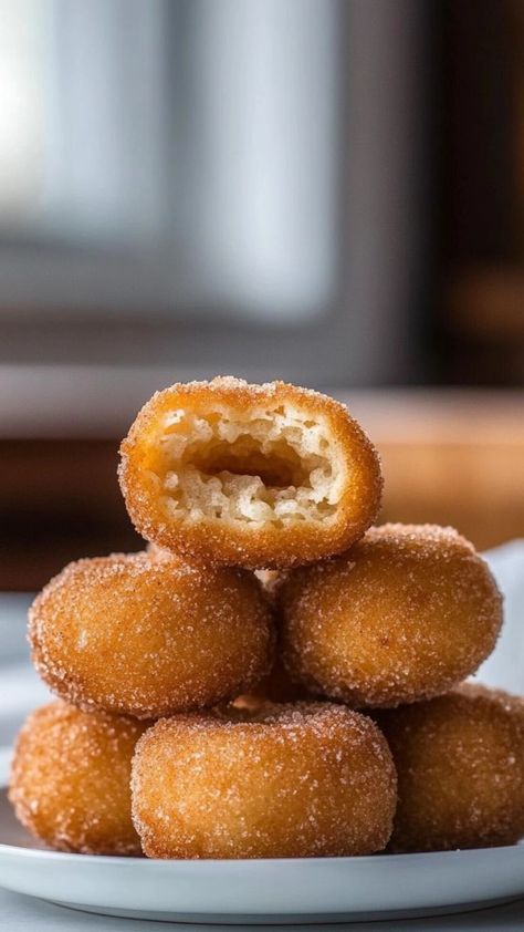 Satisfy your churro cravings with Churros Poppers! These bite-sized delights are the ultimate cinnamon sugar snack. ✨🍩 #SnackTimeFun #MiniChurros #SweetAndCrunchy #DessertLovers #CinnamonSugarDreams #BiteSizedMagic #FriedDesserts #CrispyPerfection #ChurroAddict #TreatYourself 🌟🍯 Churro Poppers, Cinnamon Sugar Snacks, Churro Bites Recipe, Air Fryer Churros, Mexican Churros, Churro Bites, Churros Recipe, Fried Dough, Chocolate Sauce