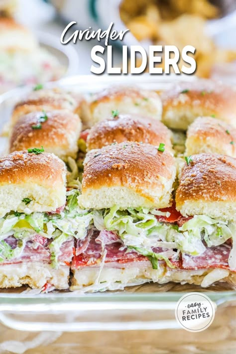 The ultimate flavor-packed delight: Italian Grinder Sliders! These adorable bite-sized versions of the classic grinder sandwich have layers of deli meats, ooey-gooey melted cheese, and an irresistible savory glaze. Trust me, these sliders are like a flavor explosion in every bite! Whether you're hosting a party, looking for a quick and tasty dinner option, or simply want to treat yourself to something scrumptious, these Italian Grinder Sliders are here to satisfy your cravings. Italian Grinder Sliders, Grinder Sliders, Italian Grinder, Grinder Sandwich, Dinner Party Dishes, Slider Sandwiches, Ragu Recipe, Spicy Appetizers, Tasty Dinner