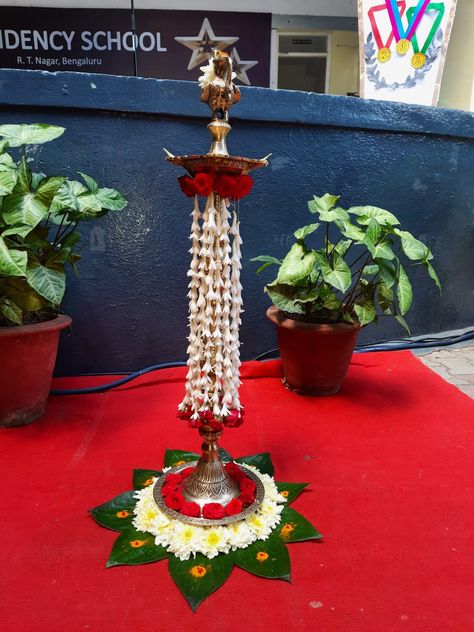 Lamp decoration Kuthu Vilaku Decoration With Flowers, Kuruthola Decoration, Lamp Decoration Ideas For Pooja, Kuthuvilaku Flower Decoration, Kuthu Vilaku Decoration, Vilakku Decoration, Vilaku Decoration, Poojai Arai, Diyas Decoration