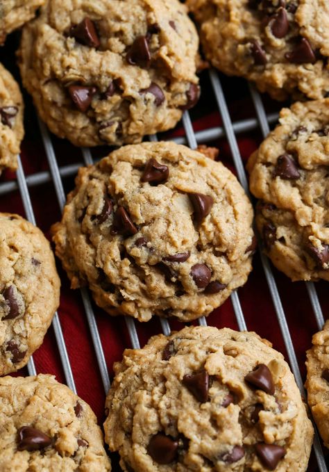 Peanut Butter Oatmeal Cookies are thick, soft, chewy, cookies! Add chocolate chips if you want to make them extra sweet, or enjoy them without. Easily add in nuts too! #cookiesandcups #peanutbuttercookies #peanutbutteroatmealcookies #cookierecipe #oatmealcookies Peanut Butter Oatmeal Chocolate Chip, Butter Cake Cookies, Butter Oatmeal Cookies, Cookies And Cups, Soft Peanut Butter Cookies, Drop Cookie Recipes, Chewy Cookies, Oatmeal Cookies Chewy, Peanut Butter Oatmeal Cookies