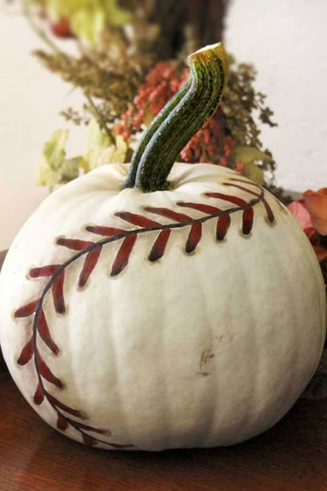 This cool and creative pumpkin is a guaranteed home run.  Get the tutorial at Life in Left Field.   What you'll need: White  Funkin ($40; amazon.com), White paint ($5; amazon.com), Black paint ($6; amazon.com), Burnt umber paint ($7; amazon.com), Red paint ($3; amazon.com) Baseball Pumpkin, Cool Pumpkin Designs, Nella The Princess Knight, Pumkin Decoration, Pumpkin Contest, Hallowen Ideas, Hallowen Costume, Creative Pumpkins, Fall Decoration