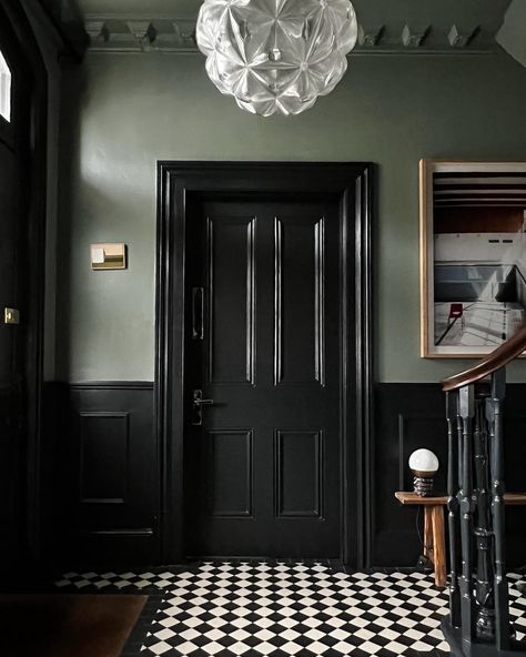 My hallway for #transformationtuesday Swipe for the before Design @helloflorauk Door Panelling, Dark Hallway Ideas, Black Trim Interior, Green Woodwork, Card Room Green, Black Hallway, Green Hallway Ideas, Card Room, Hallway Makeover