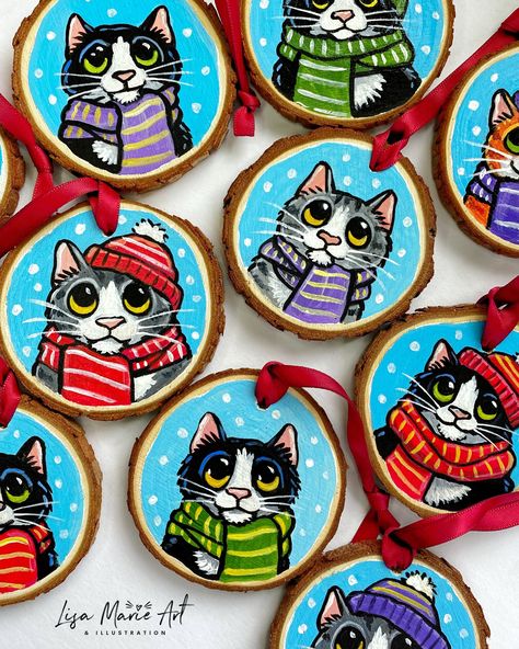 These handmade Christmas tree decorations are the PURRfect festive decor for cat lovers! Each one has been hand painted, making them all unique, and made from rustic wood slices with a festive red satin ribbon for hanging. These festive tree decorations feature tuxedo cats, grey tabbies, and ginger tabby cats wearing hats and scarves, some just wear bobble hats!. Choose the one you want from the drop down menu. * All unique and only 10 available * Natural wooden slice with bark * Hand painted using acrylic paint * Approx 7cm in diameter * Red satin ribbon for hanging * signed and dated with year on reverse side Coated with an artist grade anti-UV satin varnish on the painted side for extra protection. The natural wood and hand painted nature of this product means that there will be imperfe Hand Painted Xmas Ornaments, Unique Christmas Tree Ornaments, Wood Slice Decorations, Cat Christmas Decorations, Painted Wood Circles, Christmas Wooden Ornaments Painted, Christmas Cat Decorations, Hand Painted Christmas Tree On Wood, Painted Wood Rounds