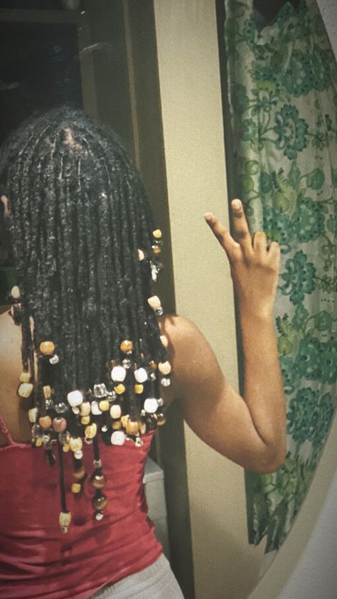 locs with beads Dread With Beads, Sister Locs With Beads, Locs With Wooden Beads, Beads On Micro Locs, Beaded Locs Styles, Locs Hairstyles With Beads, Beads On Dreads Locs, Loc Bead Styles, Locs With Beads And Shells