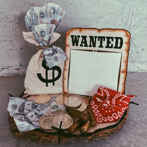 OLD WESTERN PARTY CENTERPIECE MADE WITH WOOD SLICE, MONEY, BULLETS & WANTED POSTER *PICTURE TO BE ADDED DIY Old Western Party, Cowboy Party Centerpiece, Western Party Centerpieces, Wild West Crafts, Wild West Wedding, Western Centerpieces, Western Ideas, Post Prom, Cowboy Theme Party